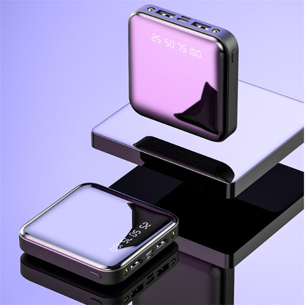 Two square, mini power banks featuring a reflective purple mirror finish and a digital battery percentage display.