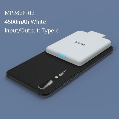 White 4500mAh Type-C mini external battery charger attached to the back of a black smartphone, displaying a blue light.