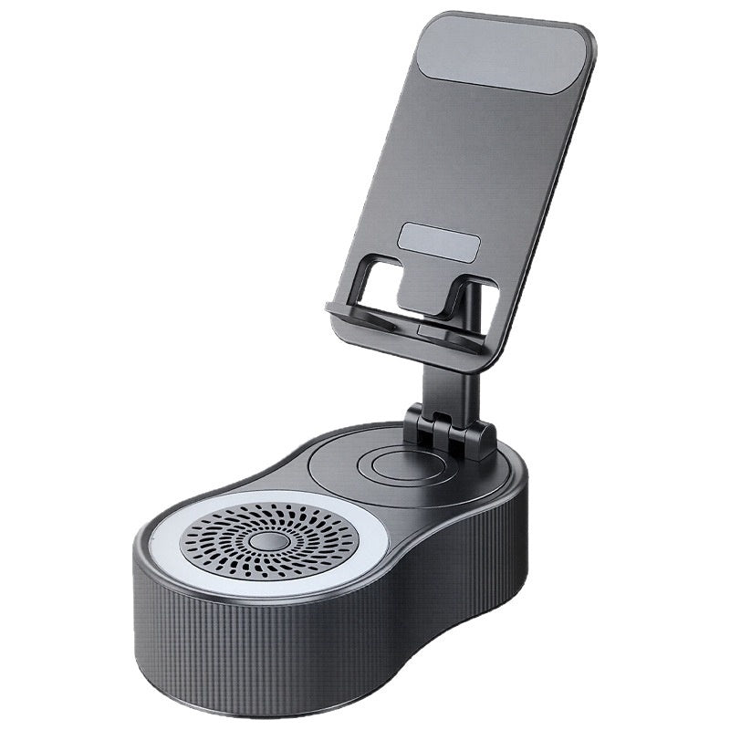 Adjustable dark gray phone stand mounted on a multi-function base featuring a speaker grille and charging area.