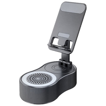 Adjustable dark gray phone stand mounted on a multi-function base featuring a speaker grille and charging area.
