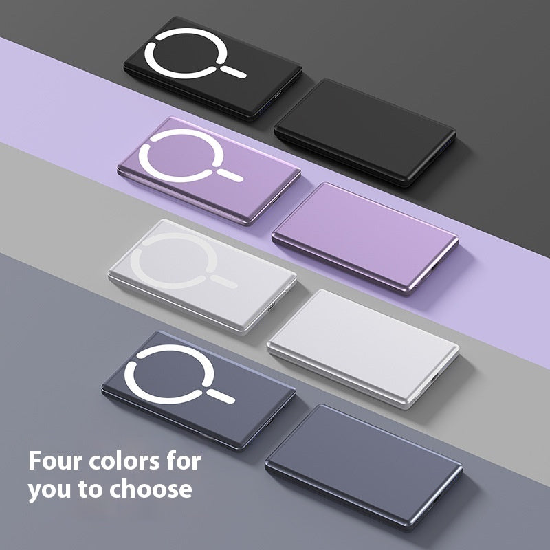 Four color options (black, purple, white, gray) of ultra-thin magnetic power banks, featuring a visible white charging symbol.