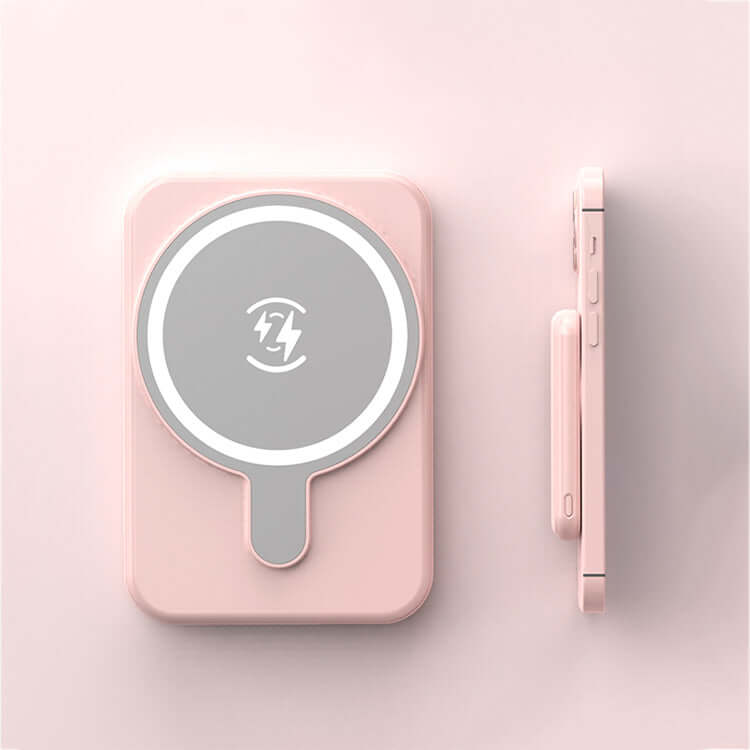 Mini Magnetic Power Bank 5000mAh Wireless in pink color, showcasing its sleek design and magnetic feature.